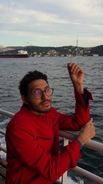 Traveler Enjoying Bosphorus Ferry Ride in Istanbul Turkey