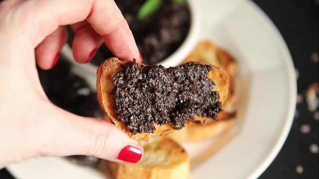 Olive tapenade appetizer black olive p&acirc;t&eacute; food preparation tasty snack fresh and delicious gourmet food background on the table rustic food top view copy space