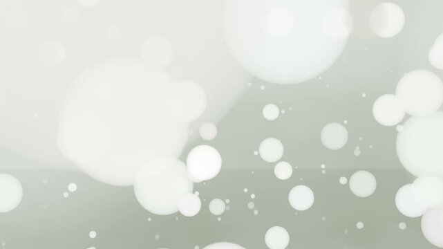 Fading white frame showing soft bokeh orbs and dust drifting across sage backdrop, creating haze
