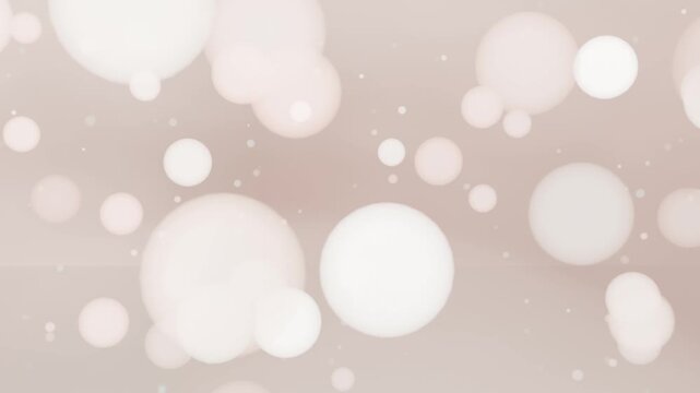 Shifting beige-pink gradient sending bokeh orbs and specks drifting outward in studio adding depth
