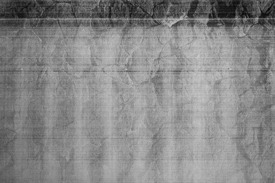 Monochrome macro shot of an inkjet print on a white piece of paper, with interesting patterns and digital textures
