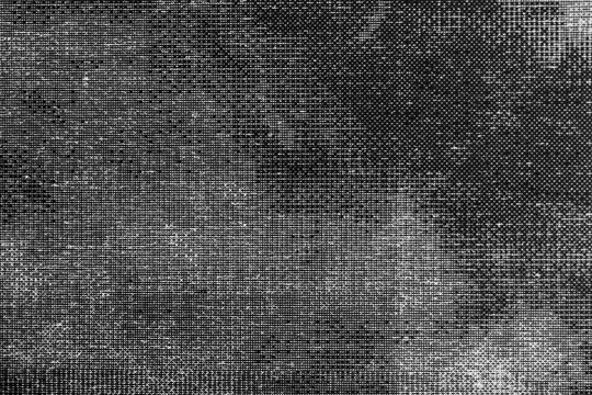 Monochrome macro shot of an inkjet print on a white piece of paper, with interesting patterns and digital textures