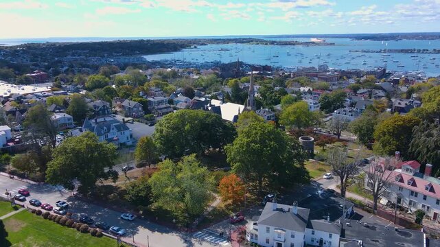 Touro Park aerial view including Windmill Tower with Newport Harbor at the background, city center of Newport, Rhode Island RI, USA. 