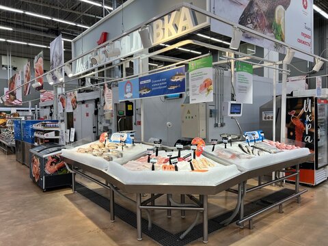 Auchan store, Ulyanovsk, Russia, June 6, 2026. Fresh chilled fish on ice. Signage in Russian: "My Fish Shop"