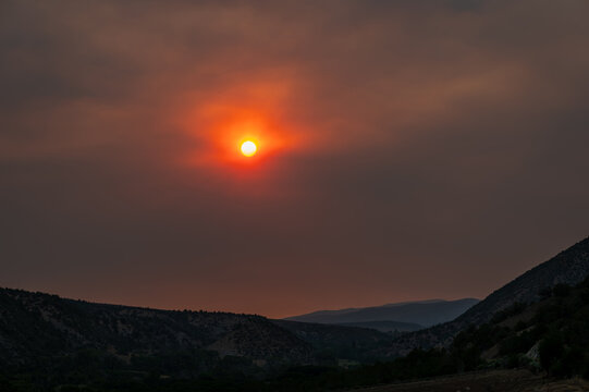 Wildfire enhanced sunset and cloudscape over Grass Valley in western Colorado on June 28, 2026.