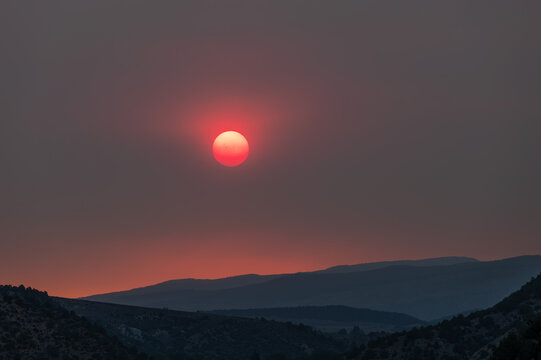 Wildfire enhanced sunset and cloudscape over Grass Valley in western Colorado on June 28, 2026.