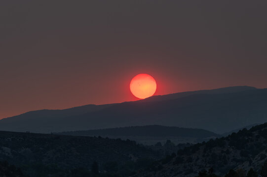 Wildfire enhanced sunset and cloudscape over Grass Valley in western Colorado on June 28, 2026.