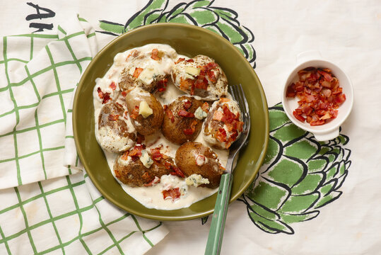 New potatoes in a creamy sauce with Dor Blue cheese and bacon.top vew