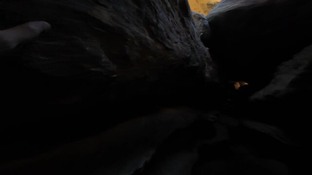 Looking for sunlight in Hummingbird Tunnel Cave - Action Camera Simi Valley California USA