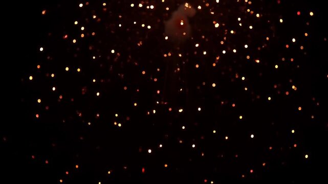 Magical night sky filled with glowing lanterns ascending into the darkness.