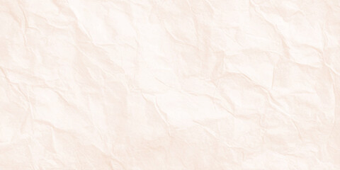 Fototapeta premium Crushed beige paper texture, abstract crumpled background, surface detail.