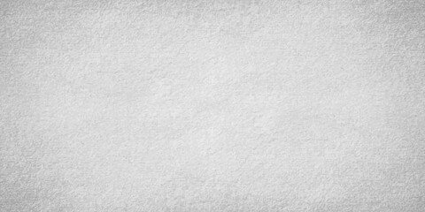 Fototapeta premium A textured, concrete surface with subtle imperfections and a neutral gray tone provides a versatile and minimalist backdrop for design and presentation.