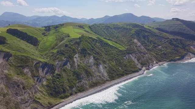 Coastal cliffs and ocean aerial panoramic landscape. Flysch Begiratokia - Baratzazarrak. Deva, Gipuzkoa, Spain.