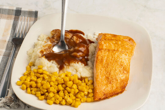 baked salmon with corn and mashed potatoes