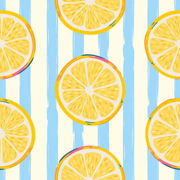 Seamless doodle lemon slices pattern with blue stripes. Summer citrus fruit background