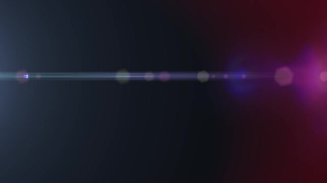 Lens flare glows softly across dark space. Colors bleed gently from left to right in soft hues