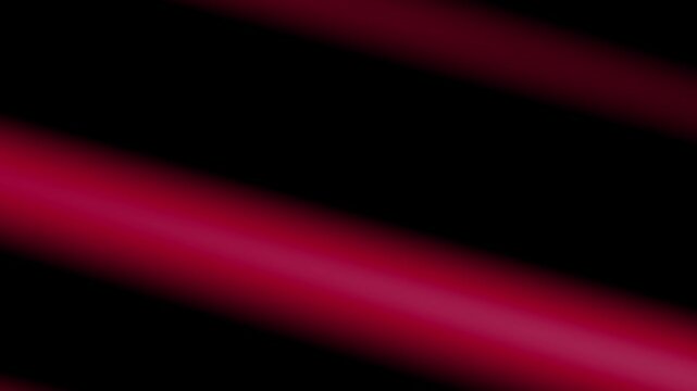 Darkness fades with glowing red and cyan streaks. Smooth gradients sweep across the frame in motion