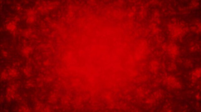 Red particles swirl in a dynamic, abstract motion. Texture pulses softly, evoking energy and mystery