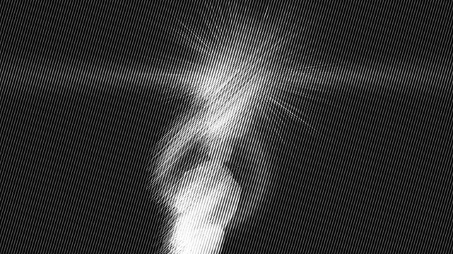 Bright light bursts through dark background. Abstract beams shoot across textured screen