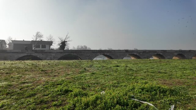 The Kanuni Sultan Suleyman Bridge, located in Silivri, Istanbul, Turkey, was built by Mimar Sinan in the 16th century. It is 333 meters long and has 32 arches.
