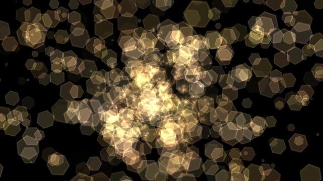 An abstract background featuring bright, golden bokeh and hexagon-shaped light particles on a black backdrop, creating a festive and luminous visual effect.