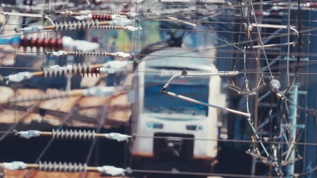 High speed electric passenger train traveling on railway tracks