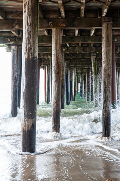 Exterior shot of the wooden support structure that carries the Sea Cliff Pier near Aptos, California.