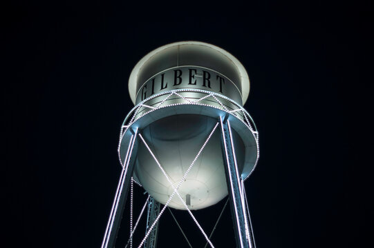 Vintage water tower at night in Gilbert Arizona