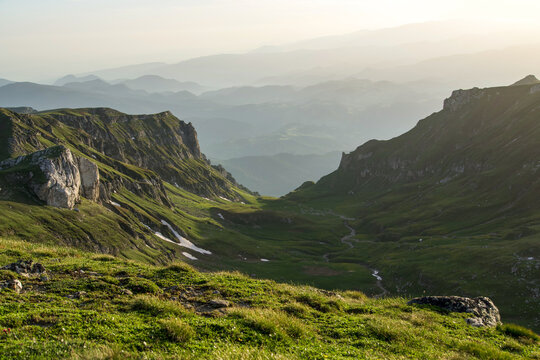 mountain landscape with fog, Gaura Valley, Bucegi Mountains, Romania 