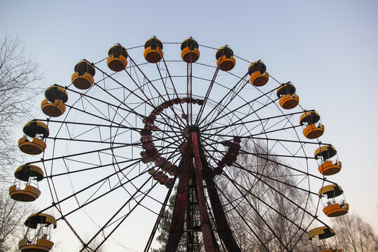 Abandoned ferris wheel in ghost town Pripyat after the Chornobyl disaster in 1986 on the nuclear station. Photo made in 2021