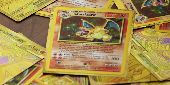 pile of ultra rare charizard base set pokemon cards, english tcg version
