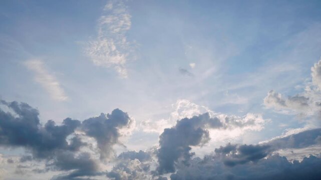 timelapse of clouds in sky with sunset
