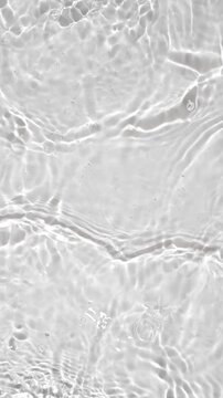 water waves cross each other creating ripples in slow motion.