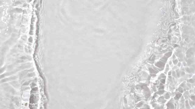 water waves cross each other creating ripples in slow motion.