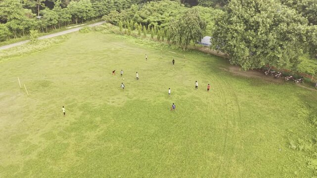 KUSHTIA, BANGLADESH &ndash; JUNE 12, 2026: Aerial view of a local football game on an open village field in Kushtia, showing community recreation and outdoor activities.
