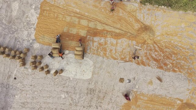 Vertical aerial view documenting the layout of the Khajanagar rice industry, including production facilities and surrounding industrial buildings.