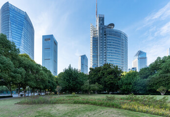 Fototapeta premium city park with modern building background in shanghai