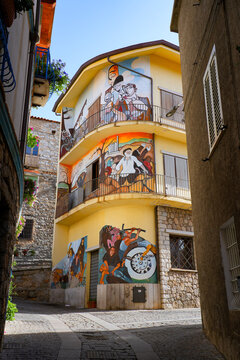 Street mural painting in Orgosolo, Sardinia, Italy