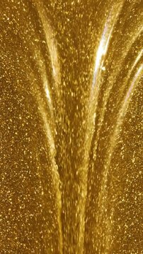 Shimmering gold glitter flowing vertically with bright light reflections and sparkling texture