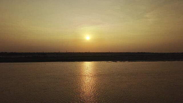 Drone Ascending Toward the Sunset Over the Padma Gorai Confluence in Bangladesh