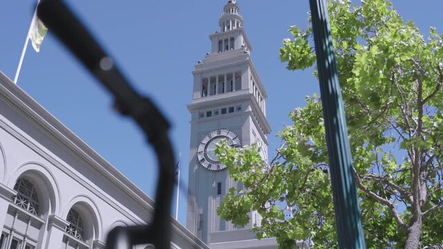 Old Ferry Building Clock Tower With Roman Numerals In San Francisco - Low, Steady Cam Shot