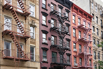 East Village area of Manhattan, colorful old apartment buildings with fire escapes © Spiroview Inc.