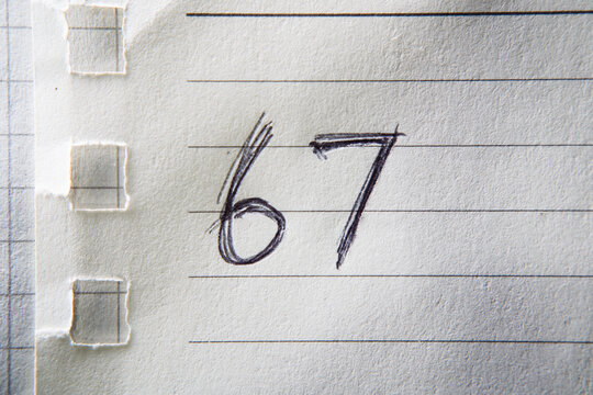 Number 67 Handwritten on Lined Paper Notebook. Gen Alpha Meme Trend.
