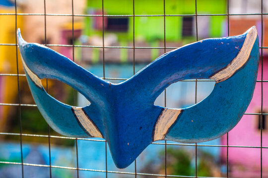 Carnival masks tied to ram wire in Malang's colorful village