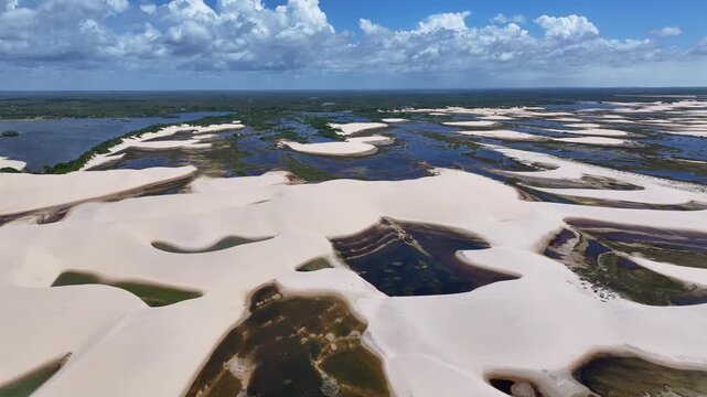 Small Sheets At Paulino Neves In Maranhao Brazil. Nature Landscape. Winding Sand Dunes. Small Sheets At Paulino Neves. Rainwater Lakes. Beautiful High Dunes. Summer Travel. Brazil Northeast.