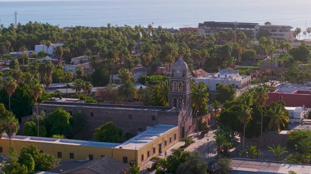 Discover aerial views of Loreto Mission church at sunrise and the beauty of Loreto, Baja California Sur, Mexico.