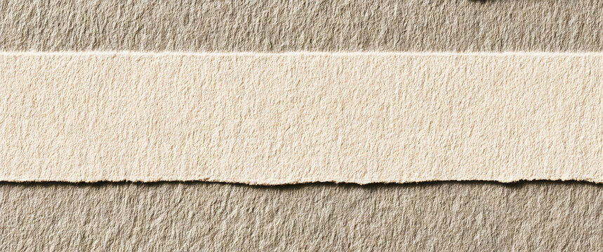 A background featuring a texture reminiscent of beige grain paper, with a rough, textured surface of the craft material, surrounded by empty space. Designed for minimalism, this template suits creativ