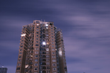High Rise Apartment Building at Night © FEITONG