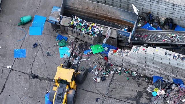 Plastic waste processing operations in recycling facility