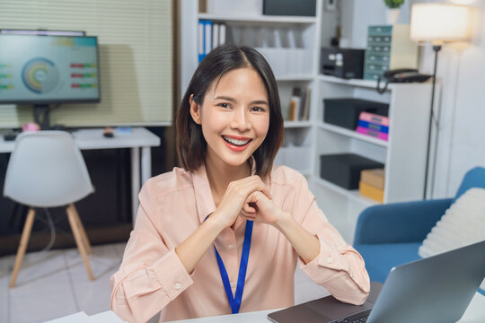 Asian businesswoman working on laptop in office, professional corporate employee and digital business concept.